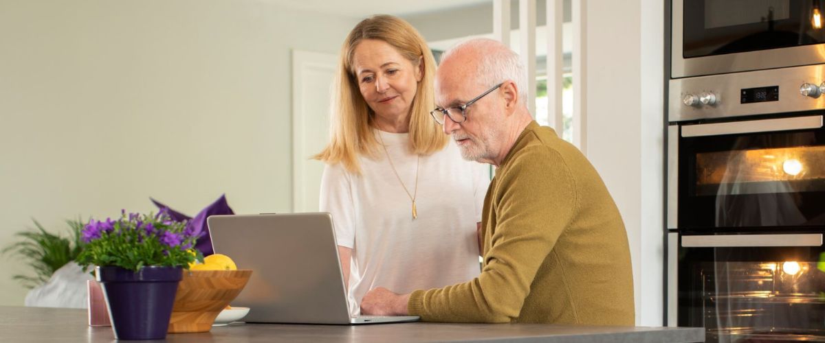 Couple looking at their bill online